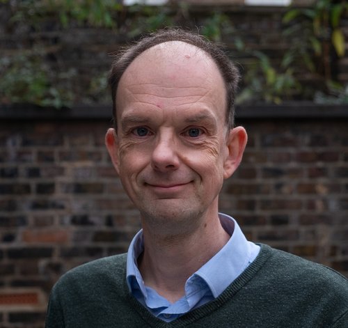 Head and shoulders portrait of Andy Bell, Chief Executive of the Centre for Mental Health.