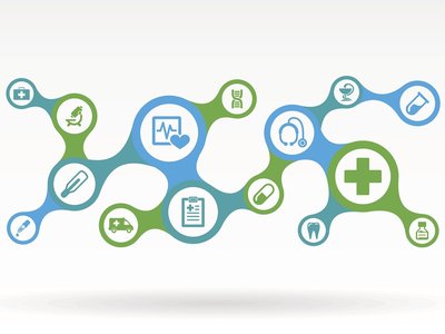 A stylised illustration of a healthcare pathway made up of connected circular icons in blue and green. The icons include a heart monitor, stethoscope, ambulance, pills, syringe, DNA strand, test tube and medical cross, all linked by a flowing line to represent joined-up care.