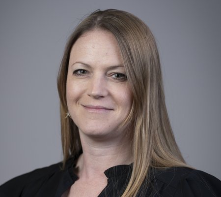 Corporate style head and shoulders portrait of Gemma Johns, Safety Investigator at the Health Services Safety Investigations Body (HSSIB).