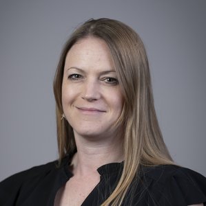 Corporate style head and shoulders portrait of Gemma Johns, Safety Investigator at the Health Services Safety Investigations Body (HSSIB).