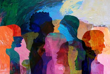Illustration of multiple overlapping side-profile silhouettes of people facing each other, filled with bright, textured colours to represent discussion and diversity.