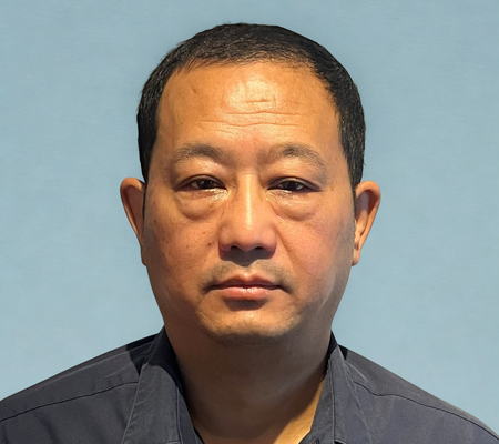 Head shot of Suraj Theeng, Operational Head of Finance.